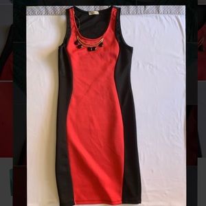 Black and red mini dress with necklace accent